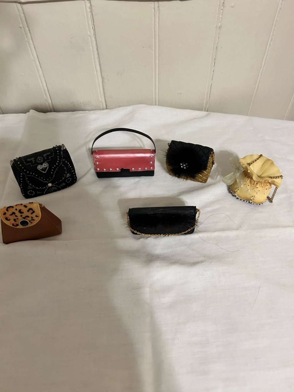 Six Miniature Decorative Pocketbooks